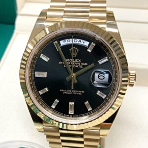 Rolex replica Day-Date 40 228238 Yellow Gold baguette black dial